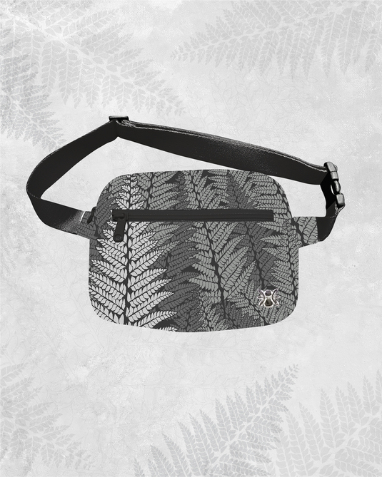 Translation missing: en.Black Palapalai ʻEke Pāʻani Fanny Pack by Hula is Life, featuring traditional Hawaiian design and adjustable strap